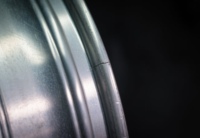 Before and after crack repair on alloy wheel – Twin City Wheel Repair Minnesota